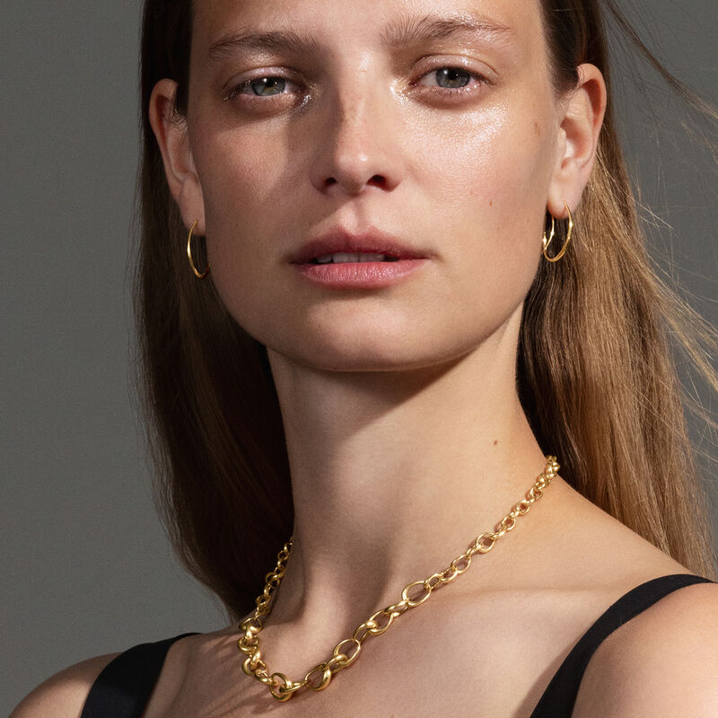 OFFSPRING earhoop, contemporary but classic gold hoop earring