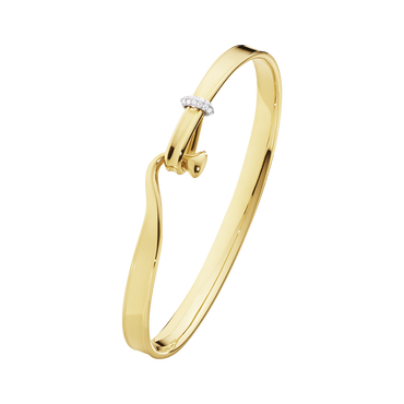 TORUN BANGLE 18ct. yellow gold bangle w. brilliant cut diamonds