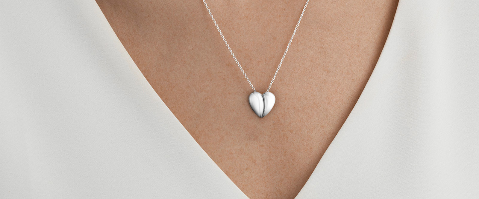 Charity heart shaped necklace with pendant from the Curve collection in sterling silver