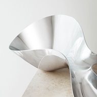 Still life image of the mirror stainless steel 1041 Henning Koppel masterpiece