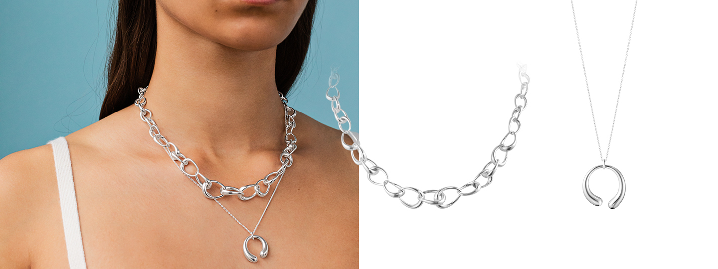 Mix of silver necklaces and pendants styled together by Georg Jensen
