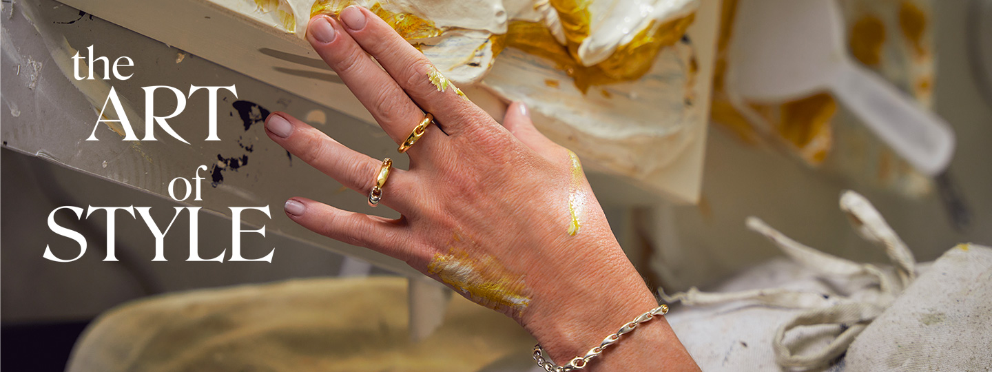 rings in 18 karat yellow gold anf bracelet in sterling silver from the reflect collection featured on the art of style campaign on artist Amanda Shadforth