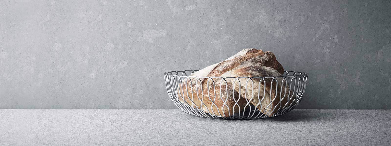 Mirror polished stainless steel bread basket from the Alfredo collection