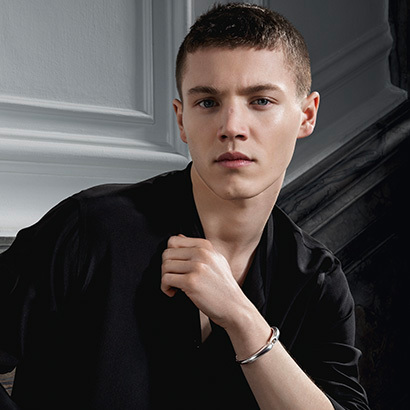 bracelet in sterling silver on prince of denmark wrist from the Reflect collection designed by Jacqueline Rabun for Georg Jensen