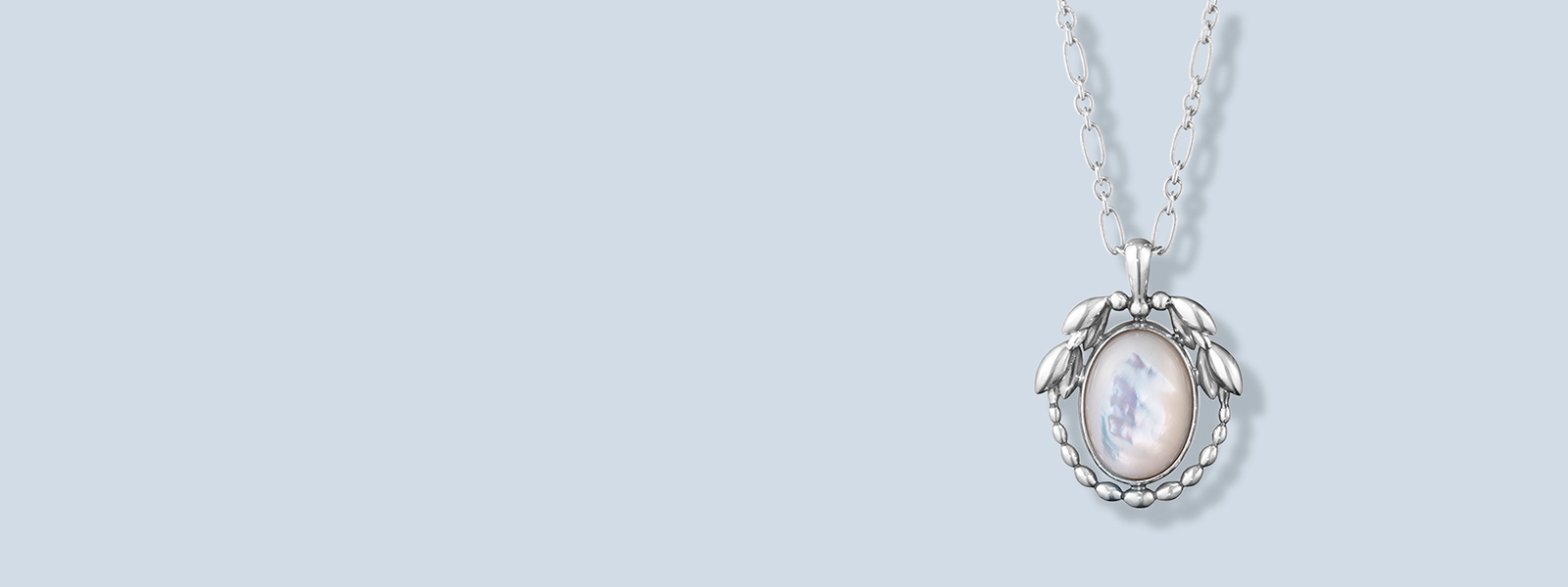 Oxidised sterling silver with mother-of-pearl stone from the Heritage collection by Georg Jensen