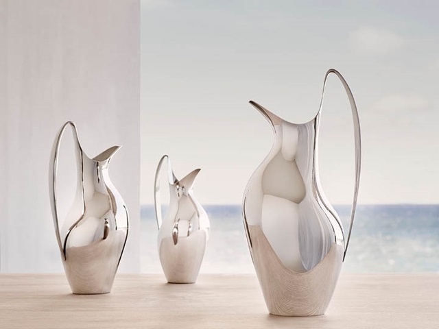 HK pitchers in mirror-polished stainless steel