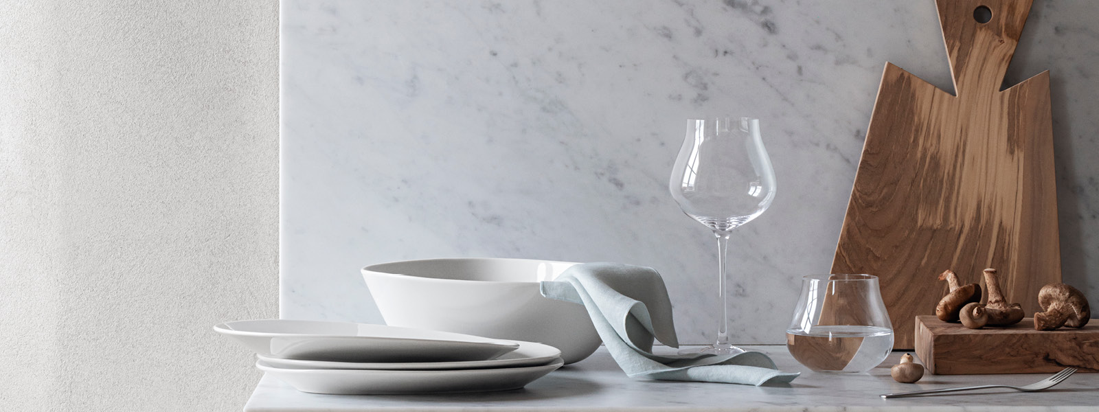 Sky collection porcelain bowls, plates and crystal clear glasses still life image