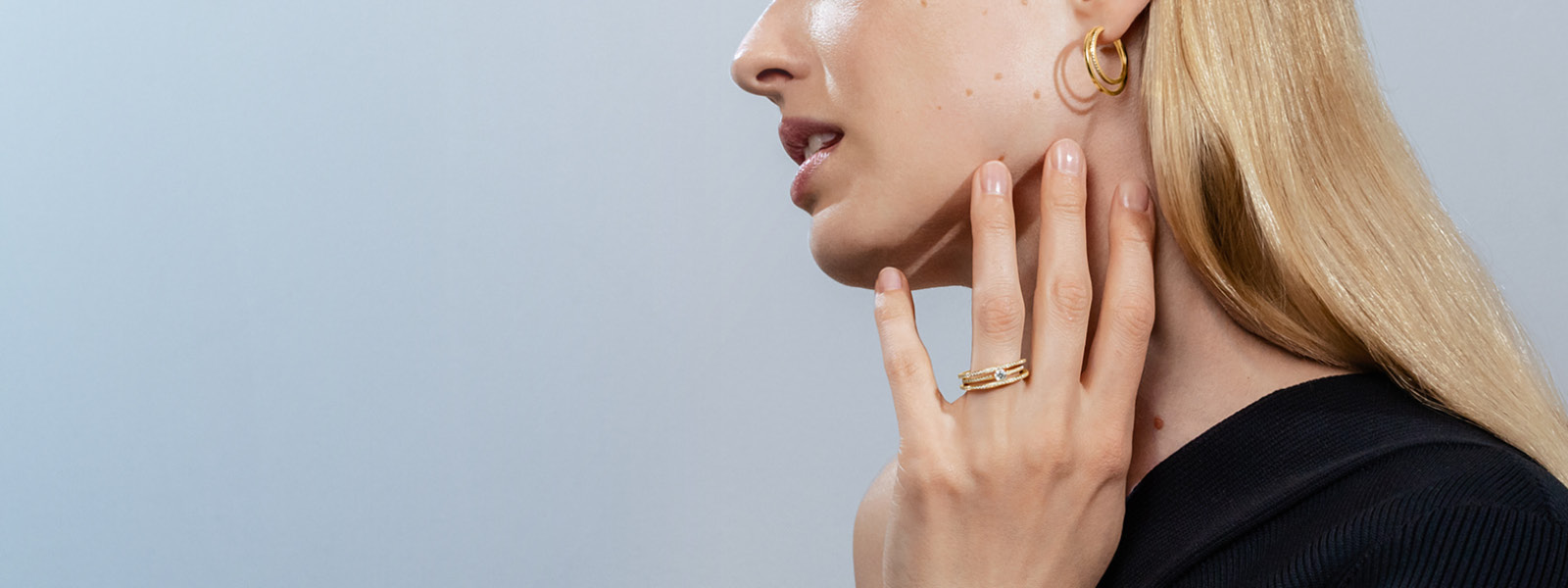 Halo solitaire ring from Georg Jensen in 18 karat gold with a white diamond 