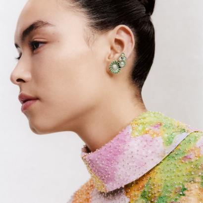 Earcuff in sterling silver and green enamel from the 2023 Daisy x Stine Goya collaboration.