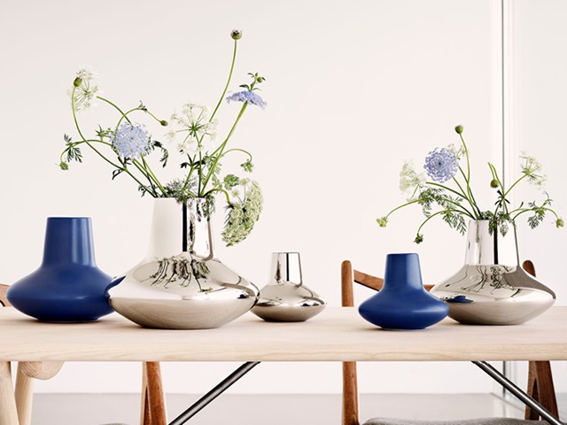 Henning Koppel vases in mirror-polished stainless steel and blue stoneware