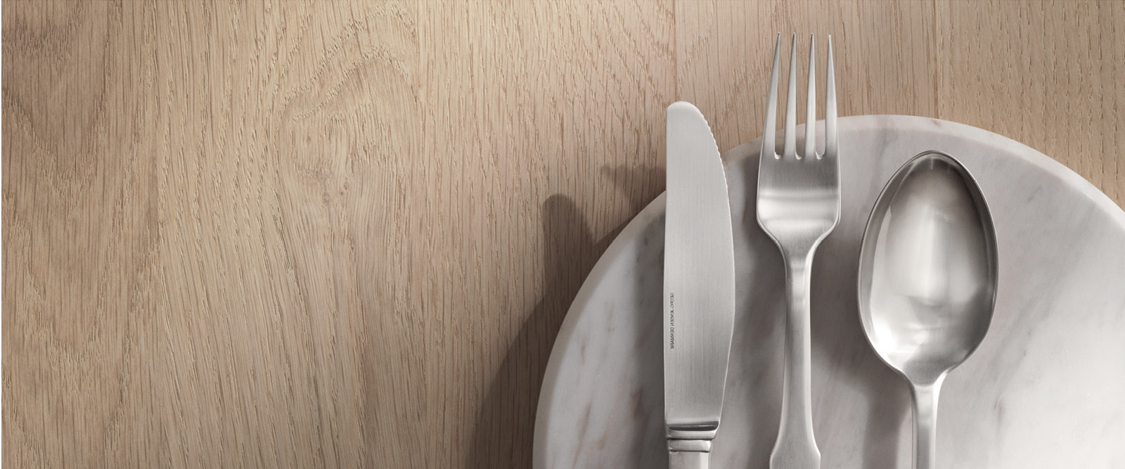 Fork, knife and spoon in stainless steel from the Mitra cutlery collection designed by Gundorph Albertus