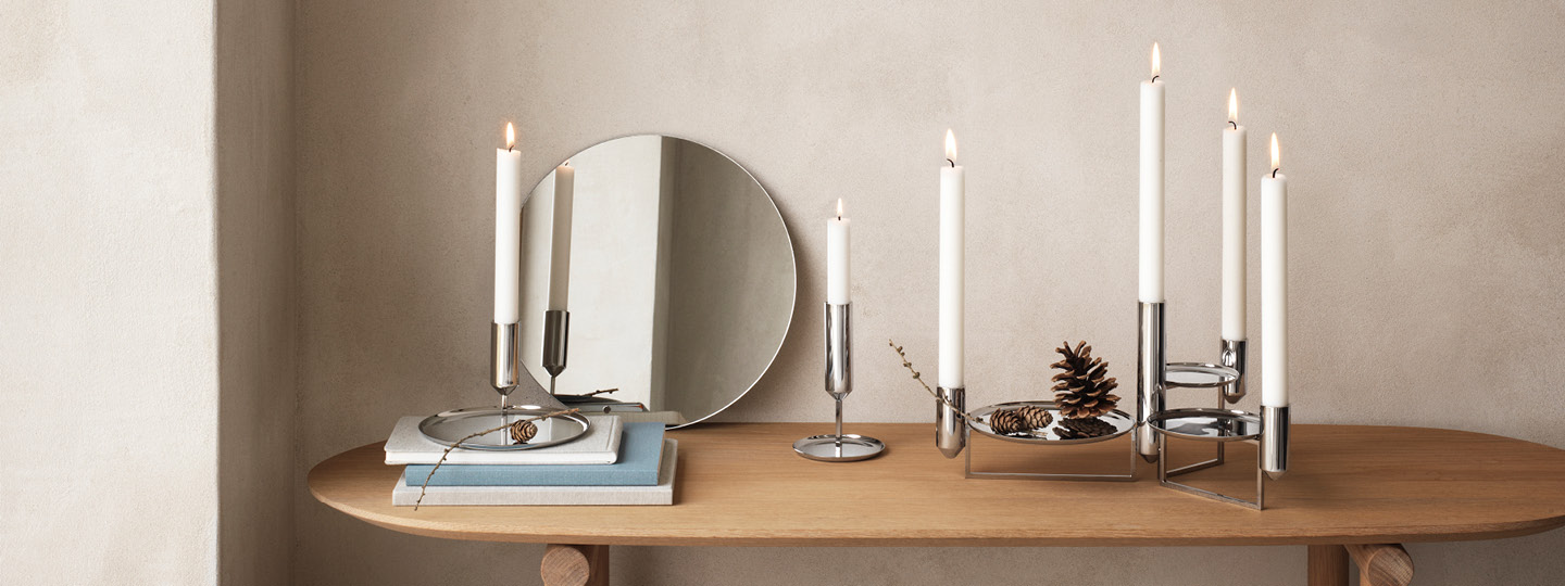 Tunes Centerpiece and Candle Holders high and low in mirror polished stainless steel 