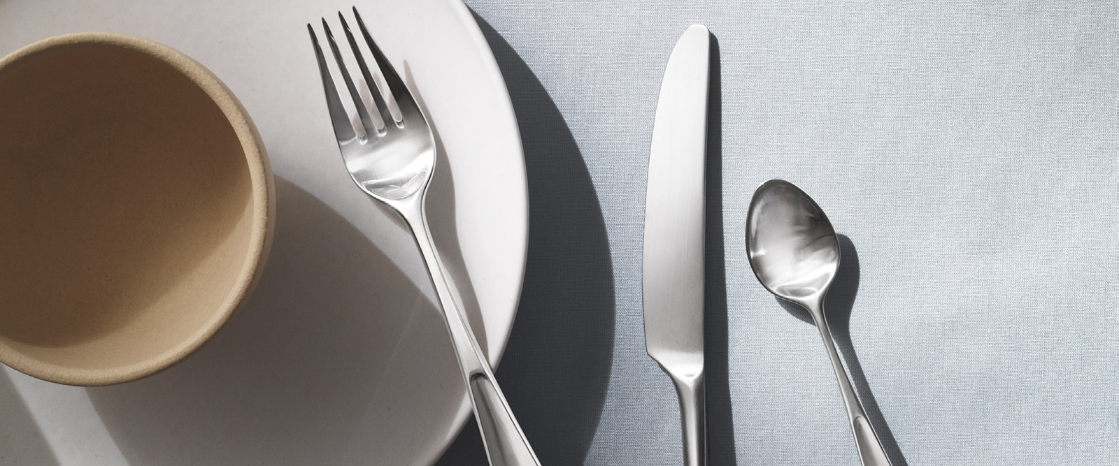 Georg Jensen Vivianna collection Scandinavian design matte stainless steel designer cutlery set of forks knives and spoons