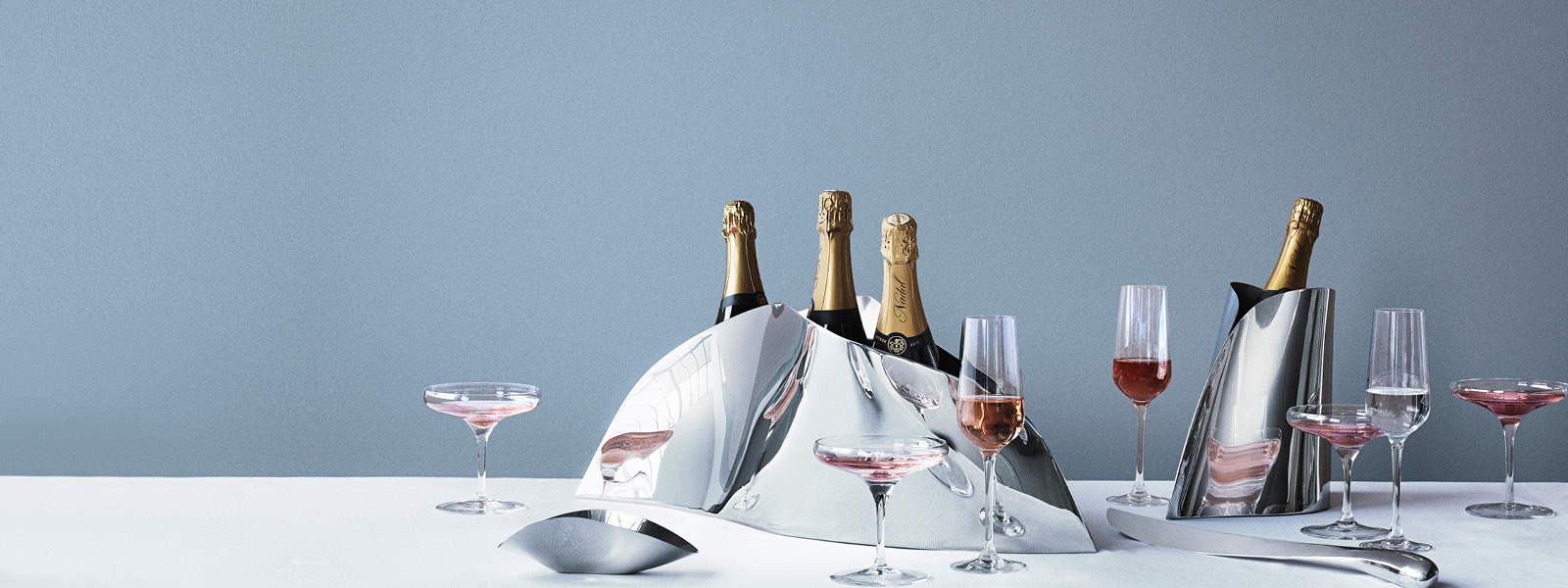 Champagne glasses and champagne cooler from the Indulgence collection by Georg Jensen
