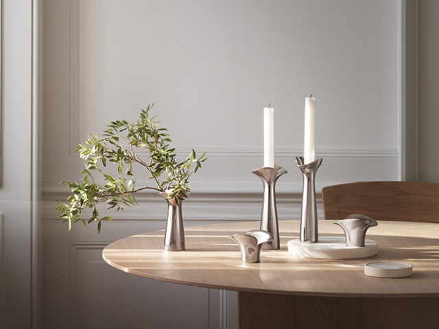 Bloom and Botanica collection Danish design mirror polished stainless steel tealight candleholders and vase by Georg Jensen
