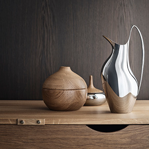 Georg Jensen mirror polished stainless steel pitcher and oak bonbonniere designed Henning Koppel 