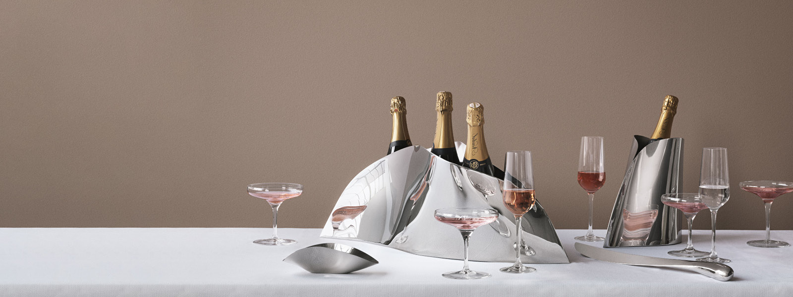 Champagne cooler in stainless steel from the Indulgence collection by Georg Jensen