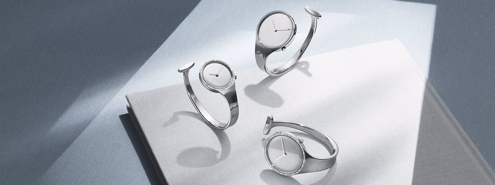 Bangle watches in Sterling Silver and diamonds from the Vivianna collection designed by Vivianna Torun Bülow-Hübe