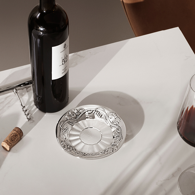 Sterling silver coaster from the Grapes Collection designed by Georg Jensen