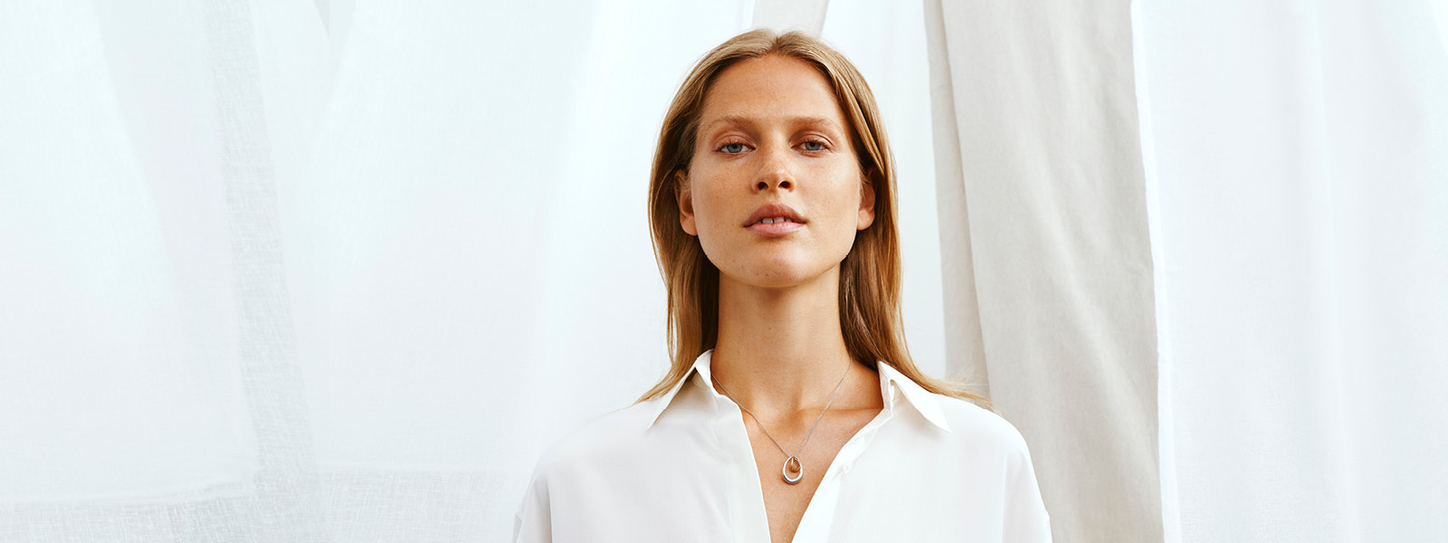 Necklace with pendant in rosegold and sterling silver from the Offspring collection designed by Jaqueline Rabun
