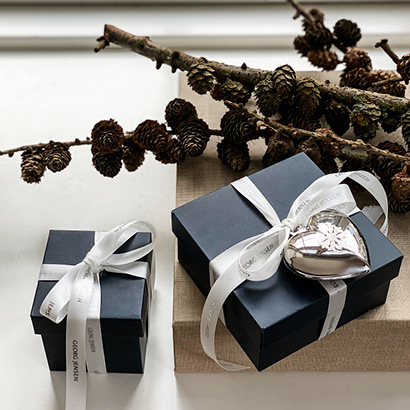 Gift wrapped Christmas presents from Georg Jensen with gift ribbons