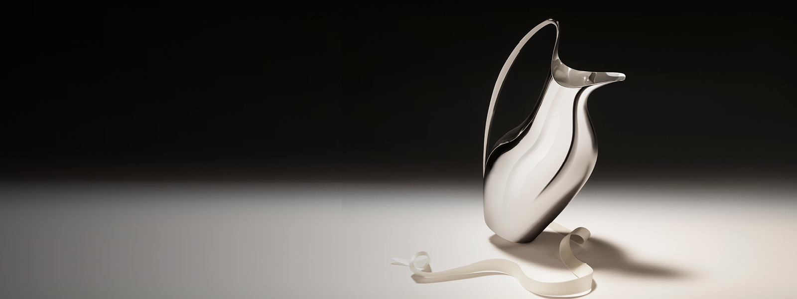 Henning Koppel Pitcher made from mirror polished stainless steel.