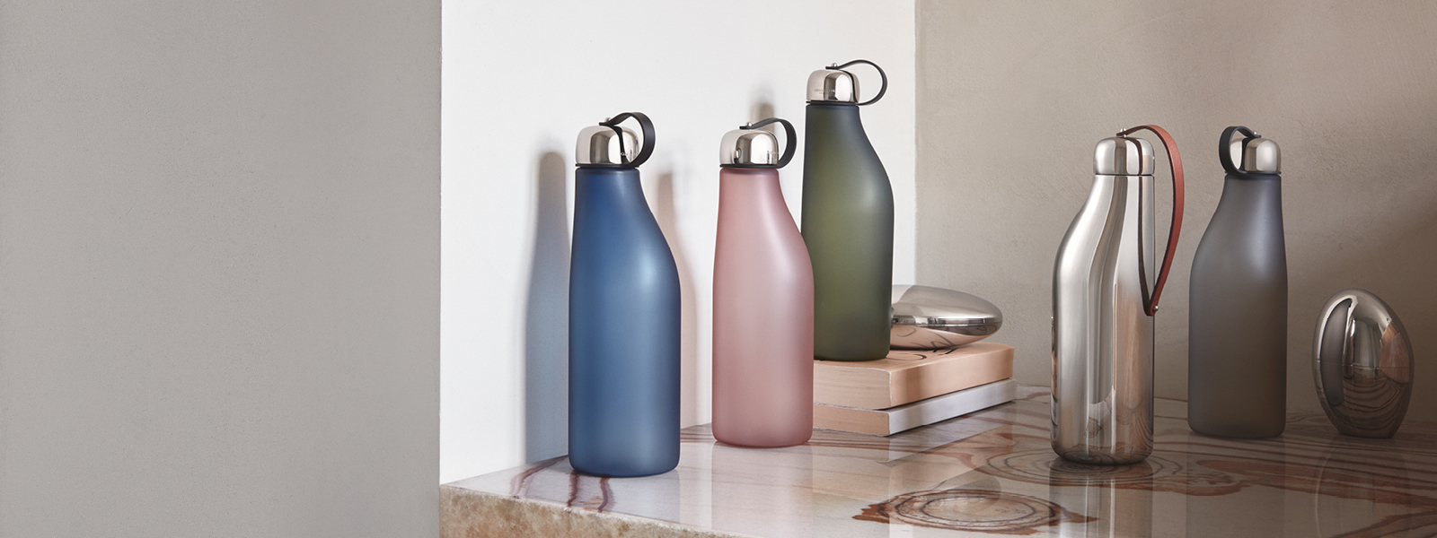 Stainless Steel and Coloured Plastic Water Bottles from the Sky Collection designed by Aurélien Barbry