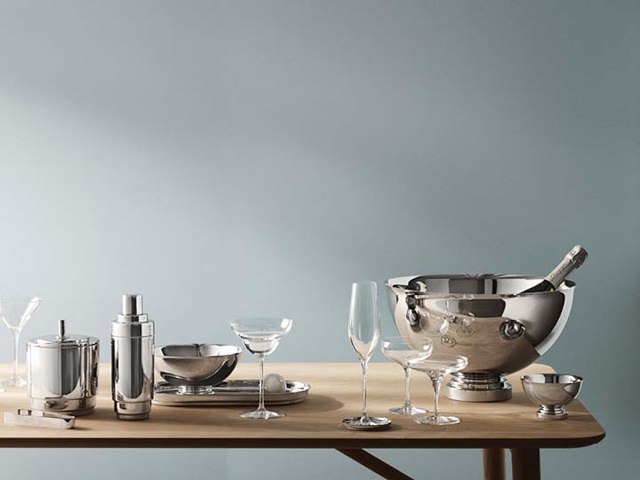 Manhattan champagne bowl, bowls, ice bucket with tongs, cocktail shaker and tray in mirror polished stainless steel