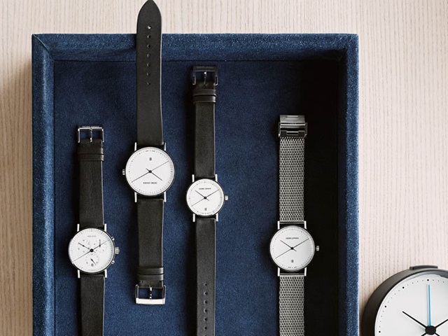 Henning Koppel watches in white dial and steel bracelet and in black leather with white dial