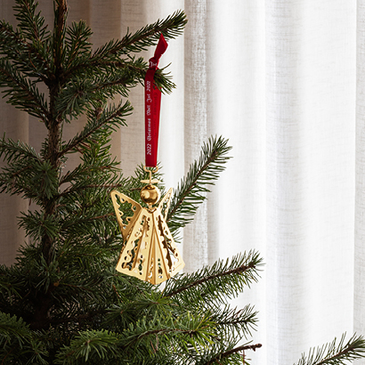 Christmas ornament in gold color designed by Sanne Lund Traberg for Georg Jensen
