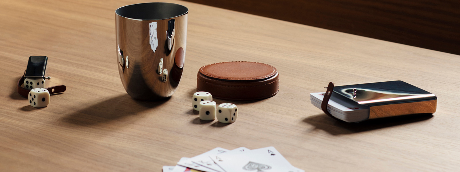 Mirror polished stainless steel and brown leather card game and dizers from the Sky collection