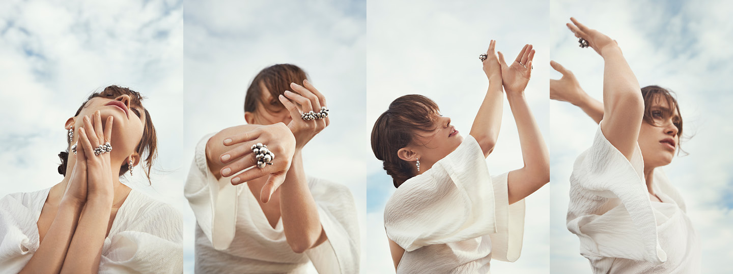 Girl moving in sterling silver jewellery from the Moonlight Grapes collection designed by Georg Jensen