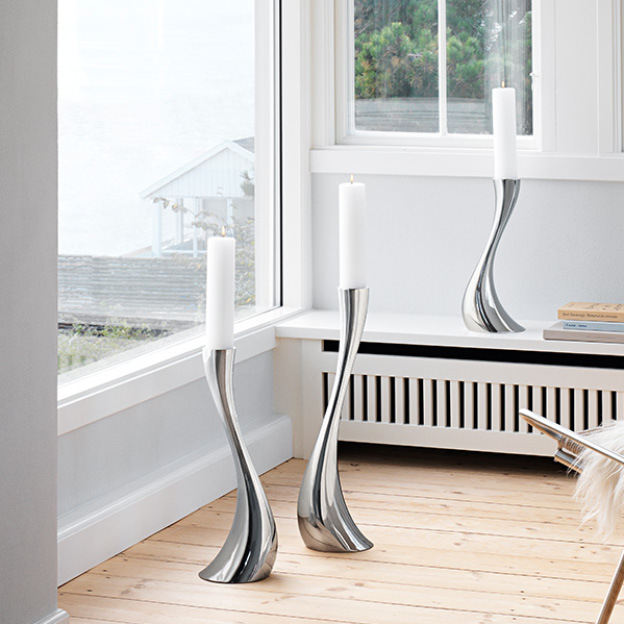Mirror polished stainless steel candle holders in small, medium and large from the Cobra collection