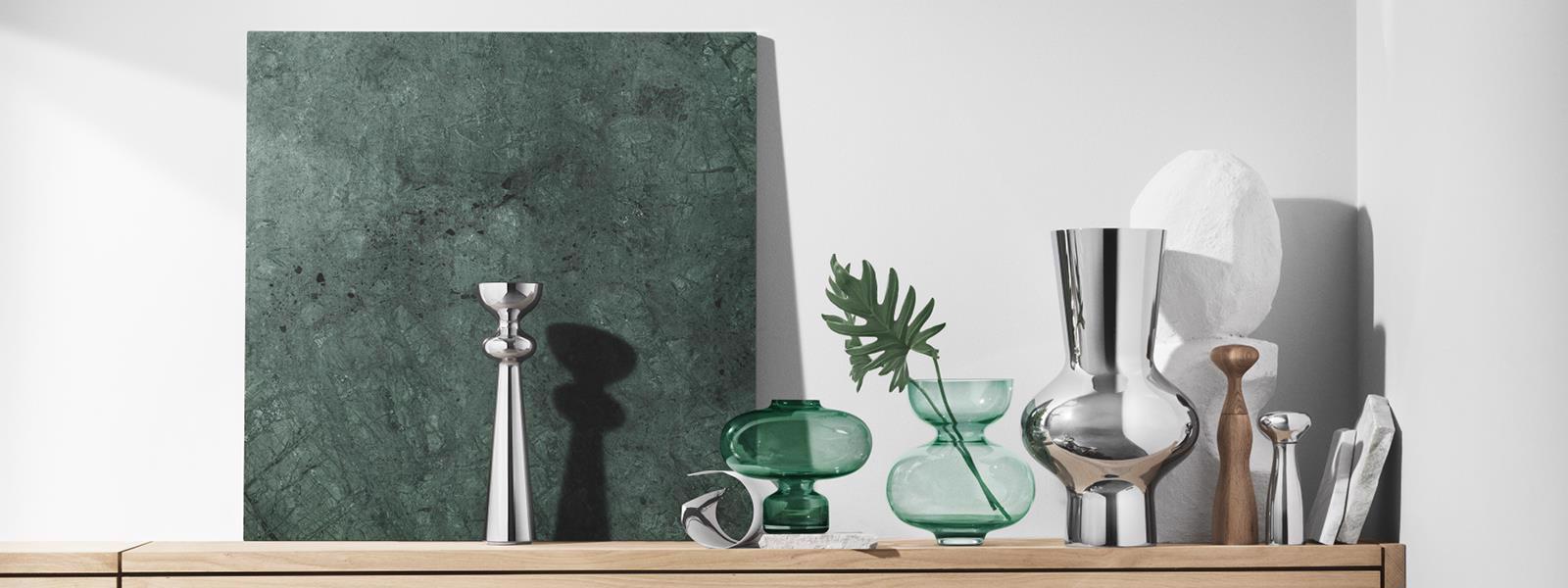 Stainless Steel and mouth blown coloured glass vases from the Alfredo collection designed by Alfredo Häberli at Georg Jensen