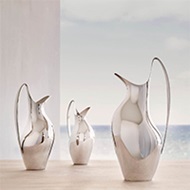 Sterling silver pitchers from the Koppel collection designed by Henning Koppel