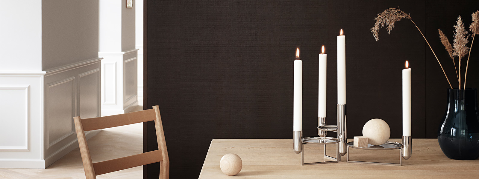 Mirror polished stainless steel candle holders from the Tunes collection