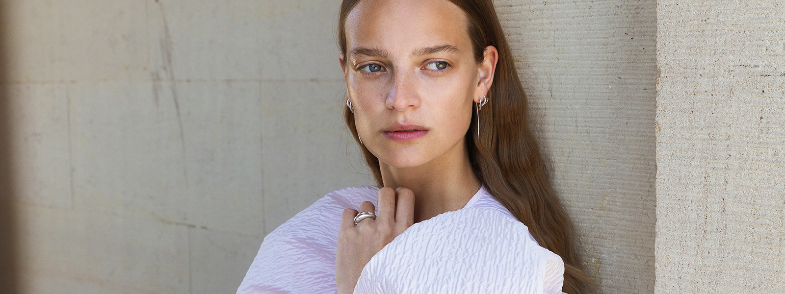 Mercy collection sterling silver earrings and rings designed by Jacqueline Rabun
