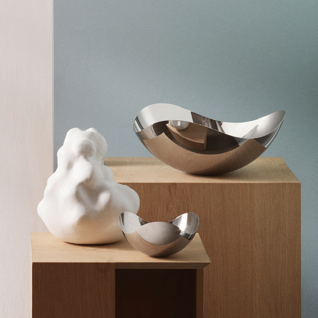Mirror polished stainless steel bowls in small medium and large from the Bloom collection