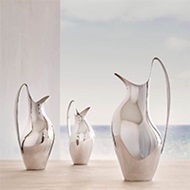 Sterling silver pitchers from the Koppel collection designed by Henning Koppel