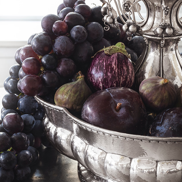 Image of the Jardiniere 1505 containing fruits. Designed by famous silver smithy Georg Jensen