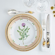 Fine sterling silver and 18 kt. gold cutlery knife, fork and dessert spoon from the Magnolia collection by Georg Jensen