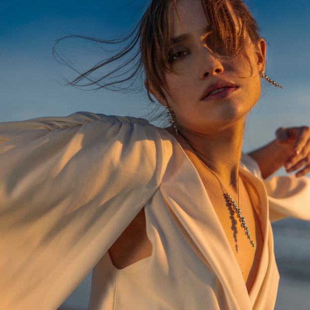 Sterling silver necklace with pandant and earrings on model from the Moonlight Grapes collection