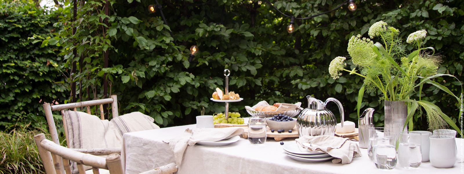 Outdoor table setting with dining items from Georg Jensen