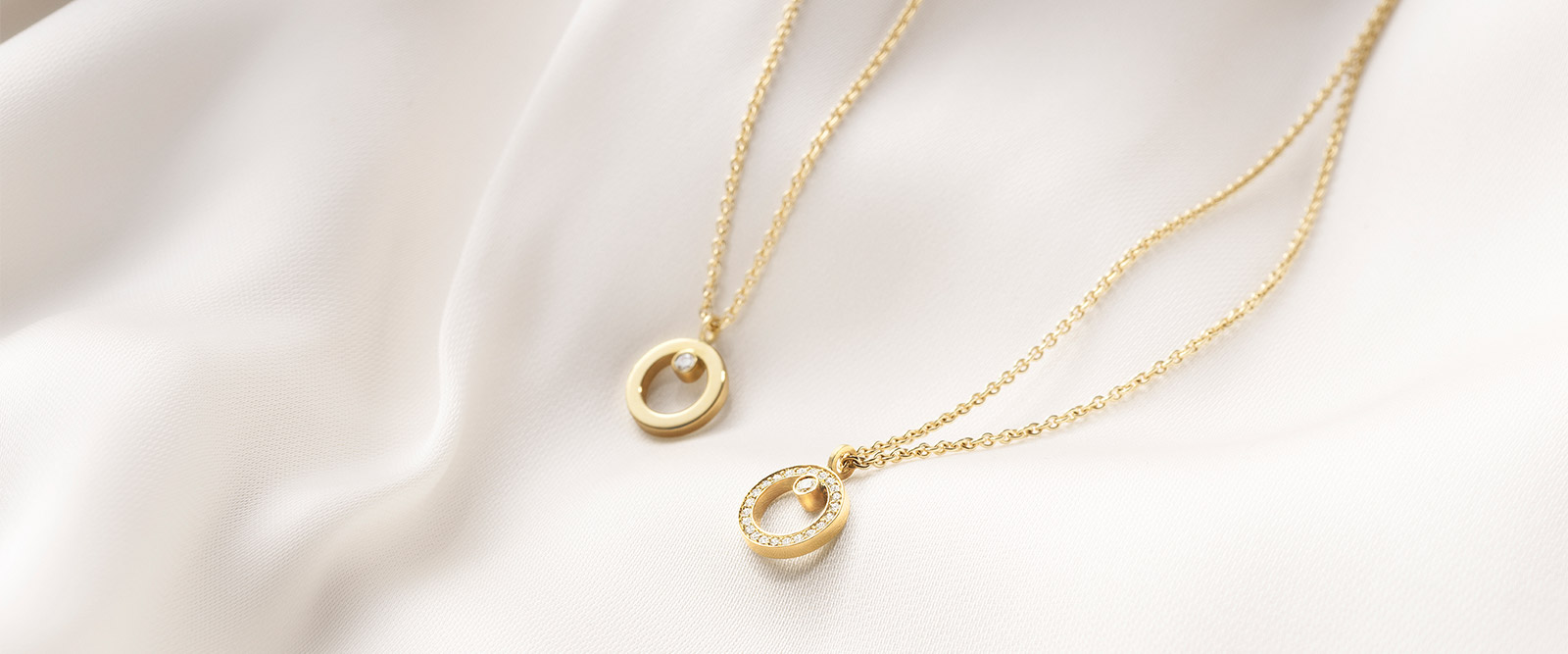 Georg Jensen Scandinavian design two Halo collection pendants in 18kt. yellow gold with white diamonds by Sophie Bille Brahe