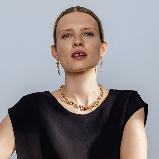 18 karat gold earrings and necklace from the Moonlight Grapes collection by Georg Jensen