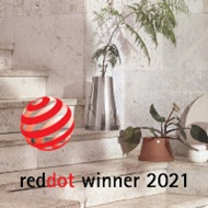 Red Dot 2021 award winning Mirror polished stainless and terracotta planter from the Terra collection designed by Georg Jensen and Snøhetta