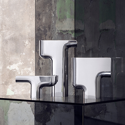 Vases in mirror polished stainless steel designed by Tokyo based studio Nendo