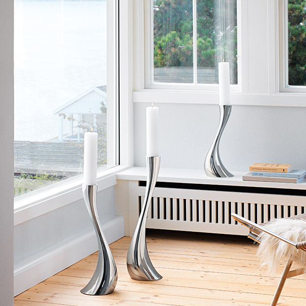 The Cobra candle holder Collection in polished stainless steel size small medium and large