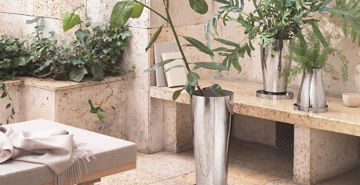 Pots and Planters in mirror polished stainless steel from the Terra collection by Georg Jensen designed by Swedish designer Snøhetta