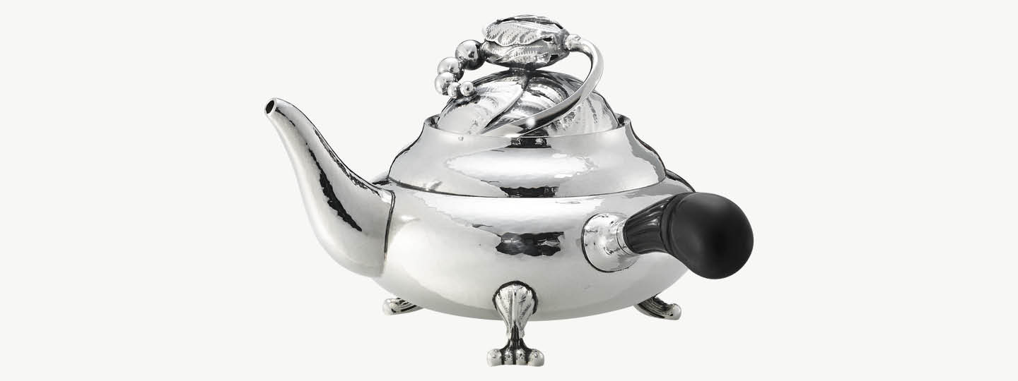 Fine sterling silver tea pot 2A from the Blossom collection designed by Georg Jensen